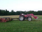 our daughter mowing hay-summer 09